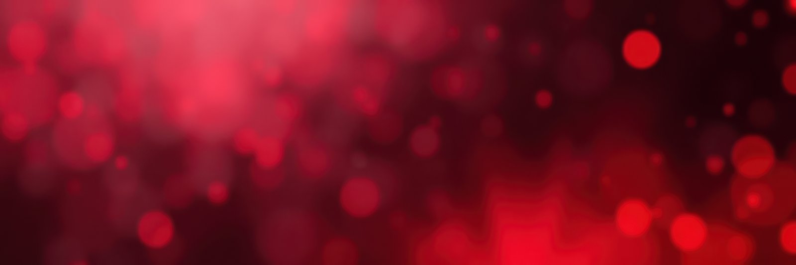 Vibrant red bokeh background creates a warm and inviting atmosphere for celebration or special occasions